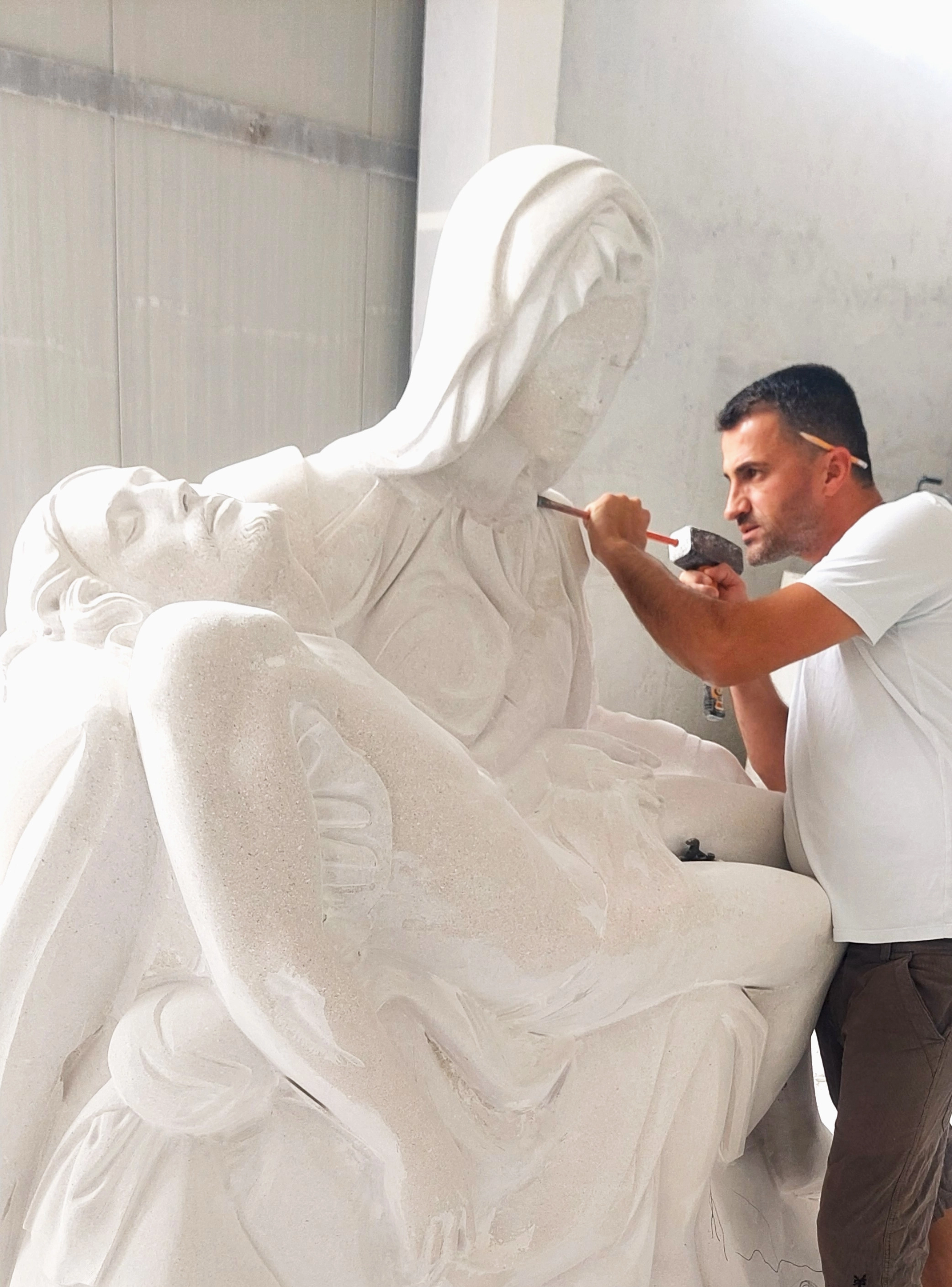 Artist sculpting